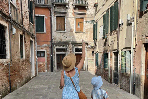 family wondering the streets of venice